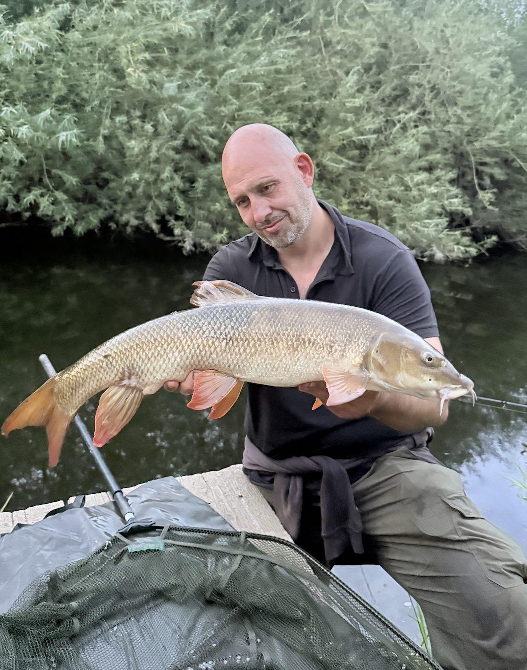 Ben with a barbel from the River Wharfe