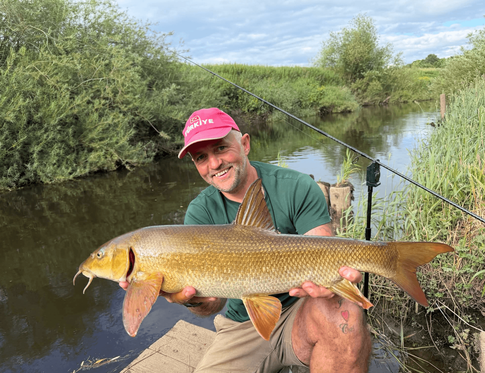 Dave and Benno with barbel at the pegs