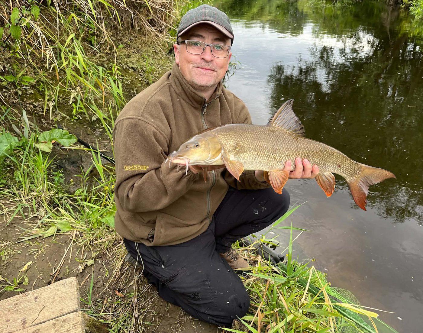 A barbel caught from the River Wharfe bank