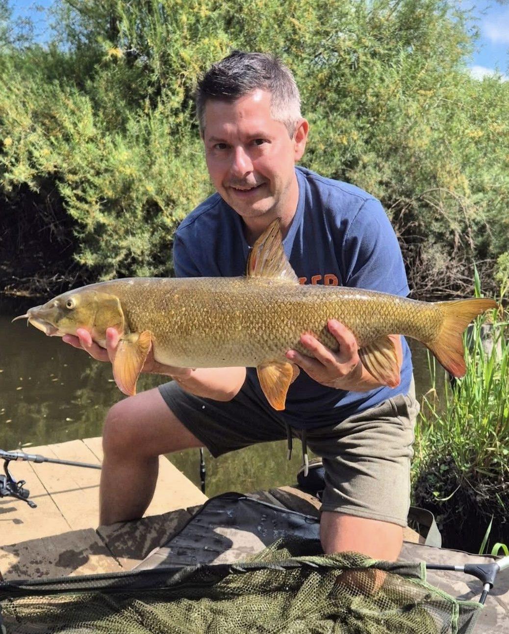 A summer barbel in brilliant sunshine