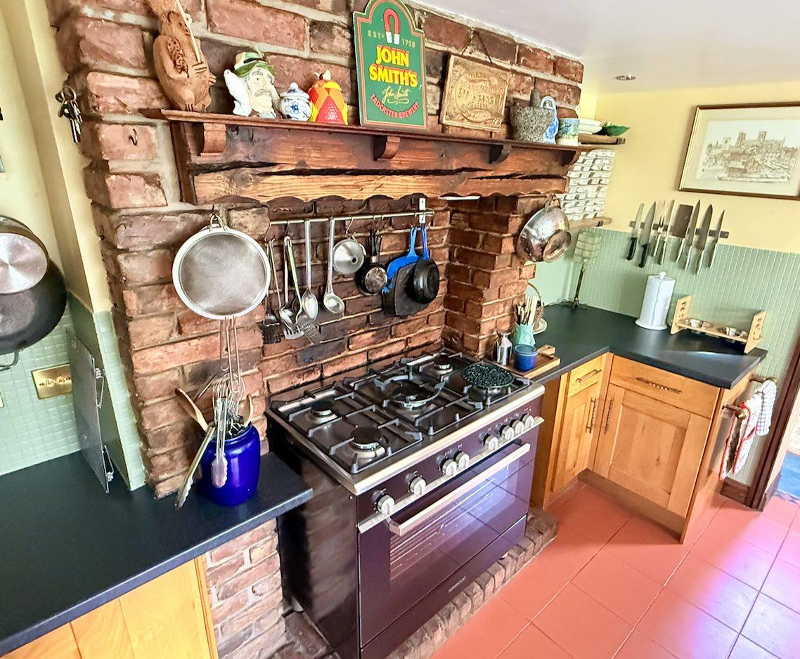 Kitchen with range cooker at Wharfe Bank Cottage
